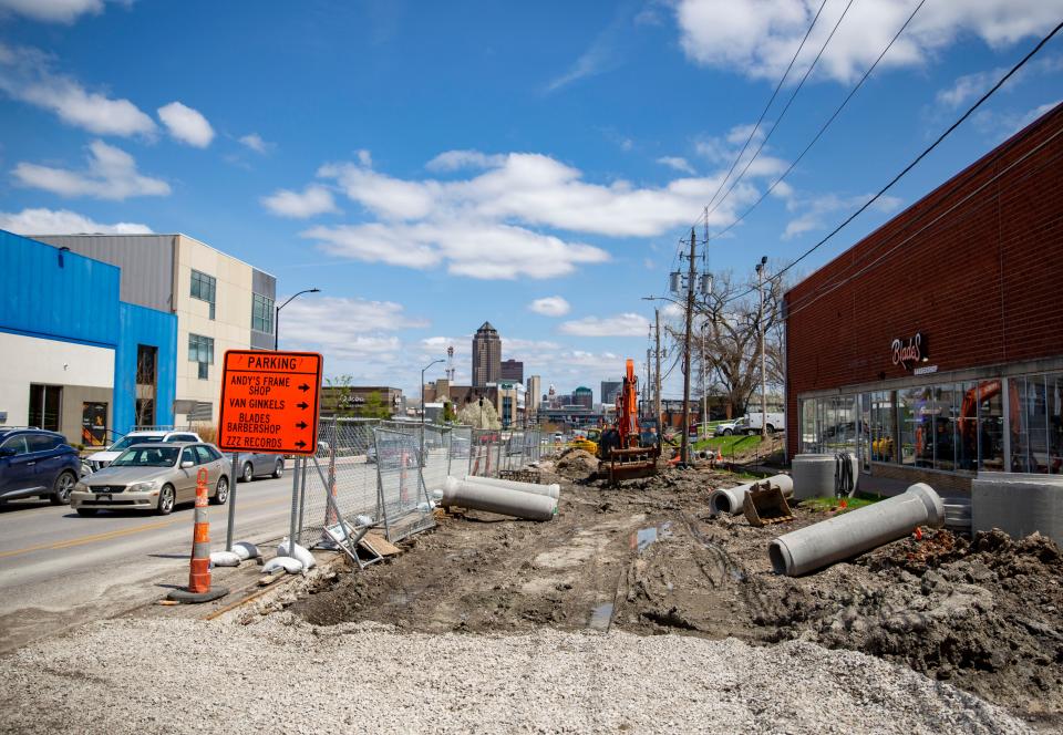 Seen Wednesday, installation of a new streetscape on Ingersoll Avenue, which began in 2020, continues this construction season, disrupting both traffic and commerce along the busy corridor lined with some of Des Moines' most popular bars and restaurants. A major influx of funding from sources including a local option sales tax is propelling a record $100 million in road-related work in the city.