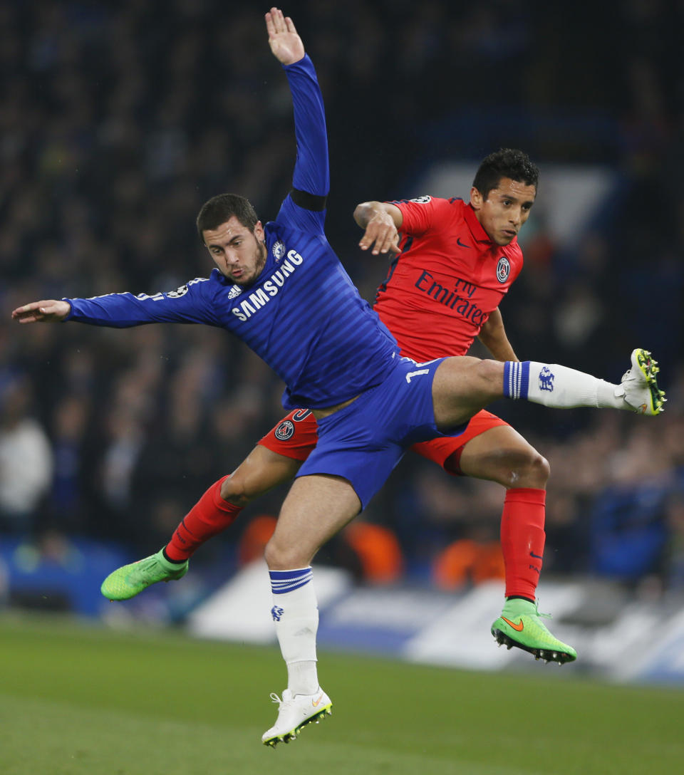 Football - Chelsea v Paris St Germain - UEFA Champions League Second Round Second Leg - Stamford Bridge, London, England - 11/3/15 PSG's Marquinhos in action with Chelsea's Eden Hazard Reuters / Stefan Wermuth Livepic EDITORIAL USE ONLY.