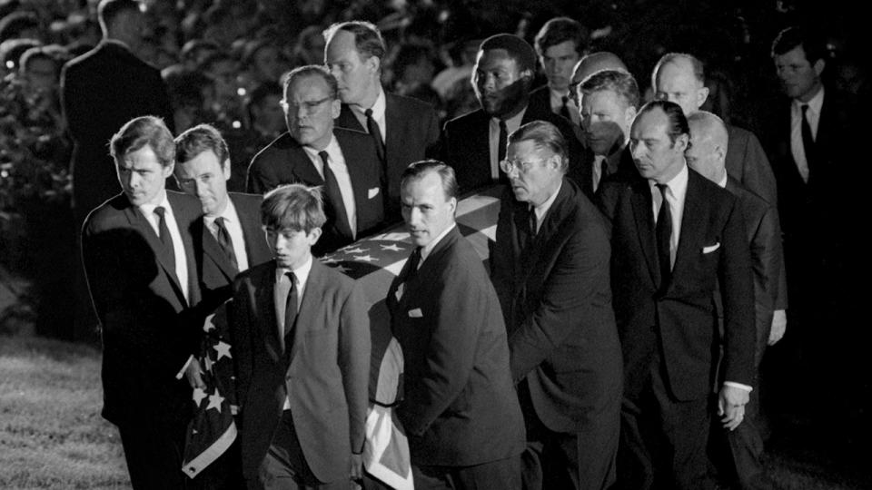 Rafer Johnson, pictured here helping to carry the coffin of Robert Kennedy at his funeral in 1968.