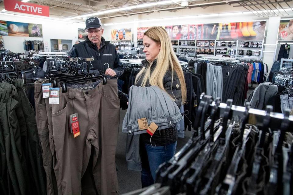 Heidi and Jeff Burns, of Terreton in Eastern Idaho, shop for pants in January 2020 at VF Outlet, one of the larger stores at Boise Factory Outlets and one of just four still operating at the time. The store has since closed.