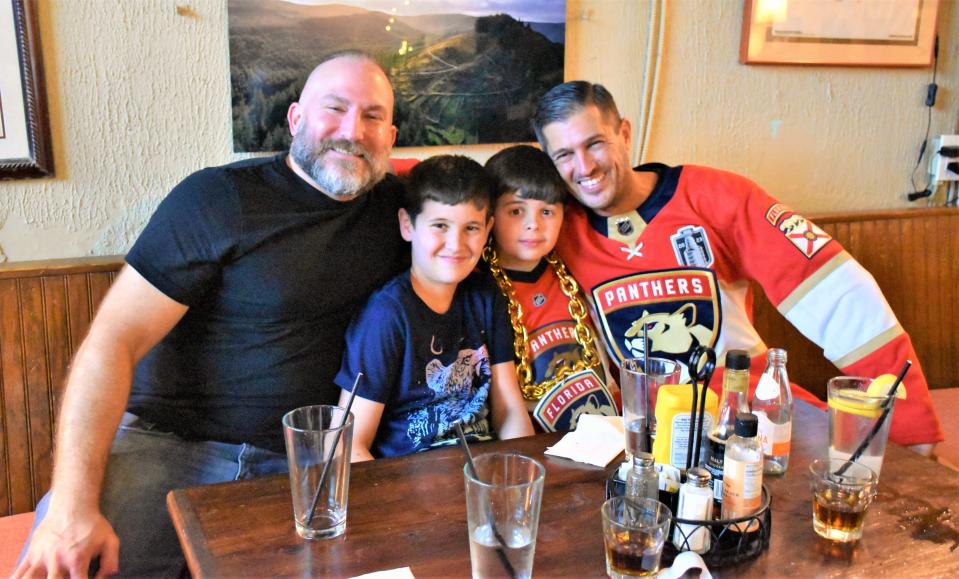 Florida Panthers fans, from left, Aramas Kaloustian, Liam Vick, Rylan Vick and Bryan Vick met at O'Shea's for Tuesday's Game 5 between the Panthers and Edmonton Oilers.