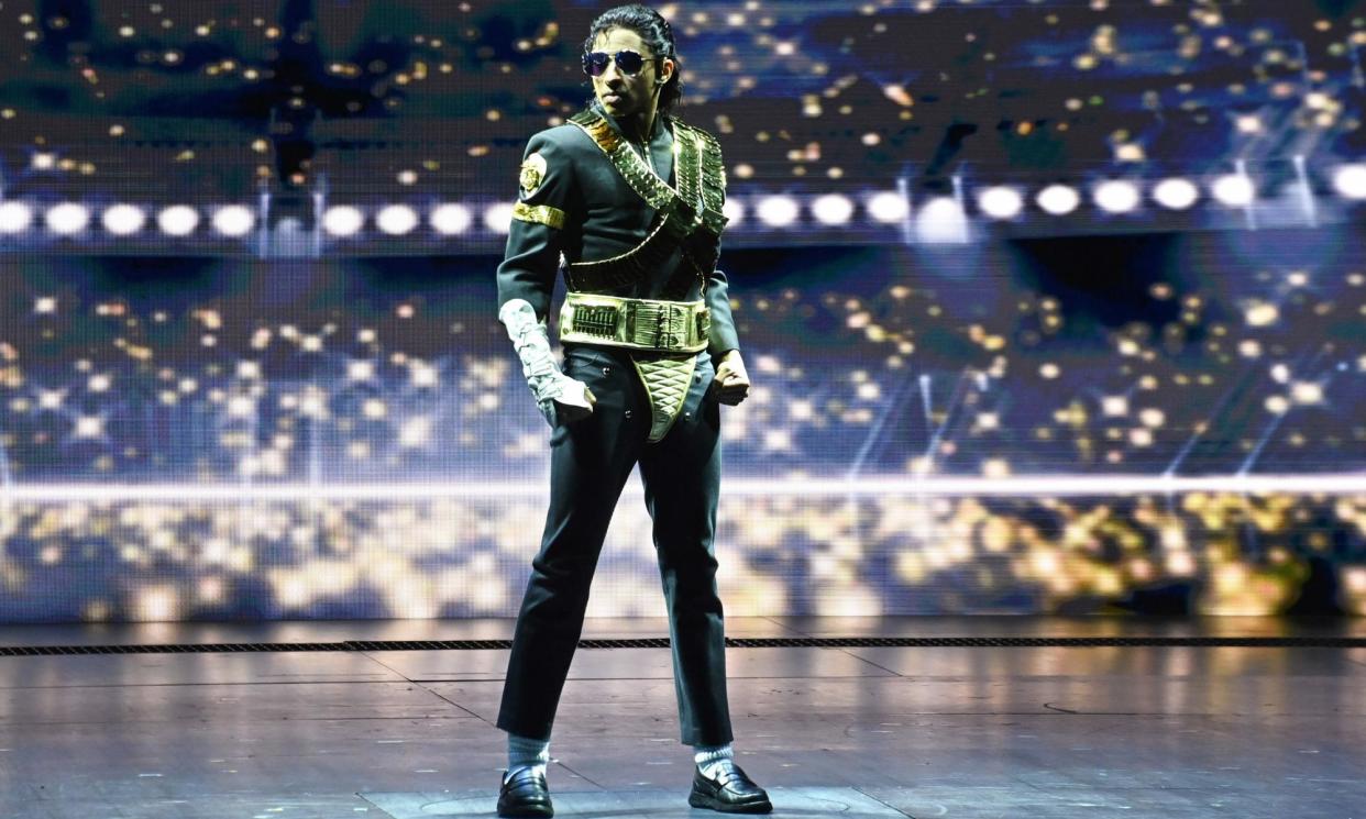 <span>‘No one’s looking at The Man in the Mirror’ … MJ on opening night.</span><span>Photograph: Dave Benett/Getty Images</span>