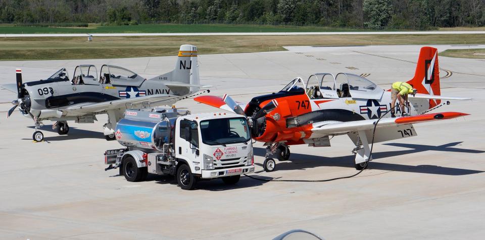 A T-28 Trojan Warbird is fueled at the Sheboygan County Memorial Airport, Friday, July 22, 2022, in Sheboygan Falls, Wis. The planes are making at stopover at the airport.