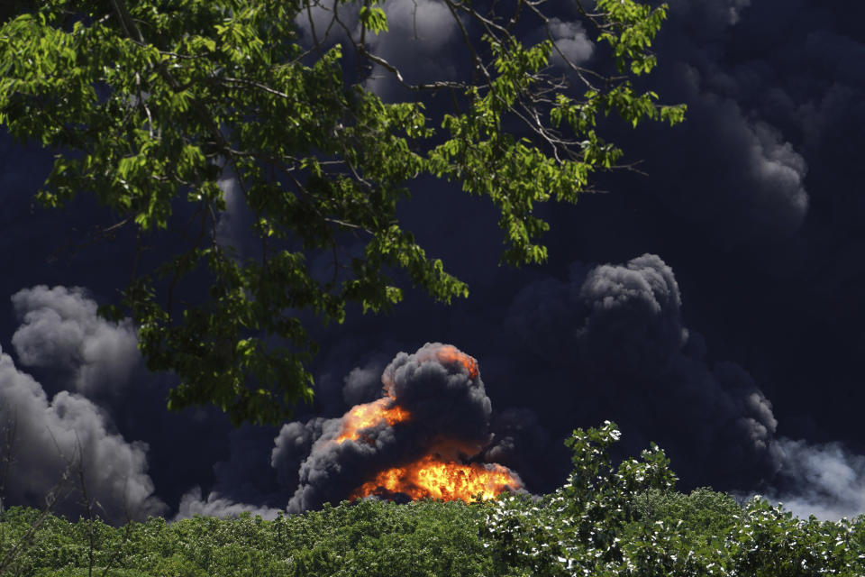 Flames and smoke are seen from an explosion at a chemical plant in Rockton, Ill., Monday, June 14, 2021. (Stacey Wescott/Chicago Tribune via AP)