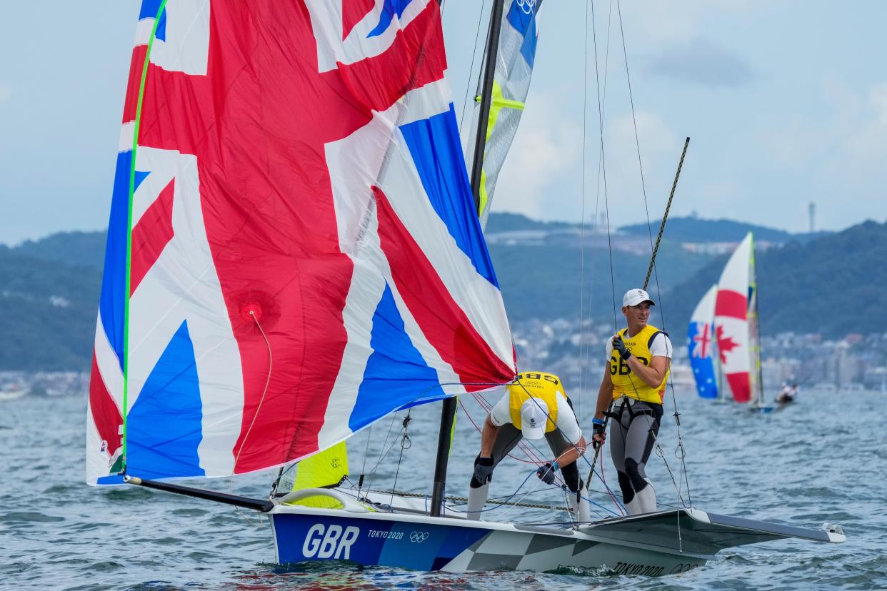 Great Britain’s Dylan Fletcher and Stuart Bithell en route to gold in the men’s 49er (AP Photo/Bernat Armangue). (AP)