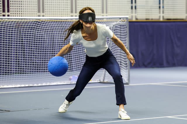 <p>Suzanne Plunkett - WPA Pool/Getty Images</p> Kate Middleton plays goalball on Oct. 12, 2023