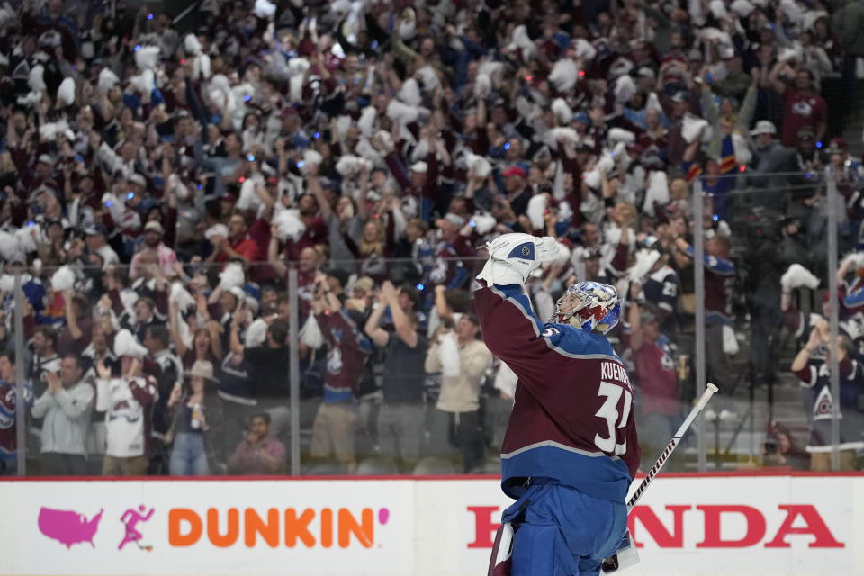 Colorado Avalanche goaltender Darcy Kuemper celebrates after the Avalanche defeated the Tampa Bay Lightning 7-0 in Game 2 of the NHL hockey Stanley Cup Final on Saturday, June 18, 2022, in Denver.(AP Photo/John Locher)