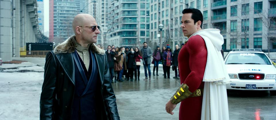 The title teen-turned-superhero (Zachary Levi, right) learns his new powers and deals with bad guys like Dr. Sivana (Mark Strong) in &quot;Shazam!&quot;