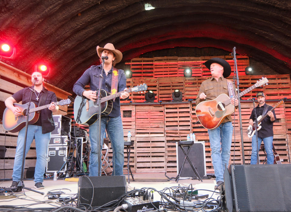 Randall King, left, joins Kevin Fowler on a song Sunday at the Panhandle Boys: West Texas Relief Concert at the Starlight Ranch in Amarillo.