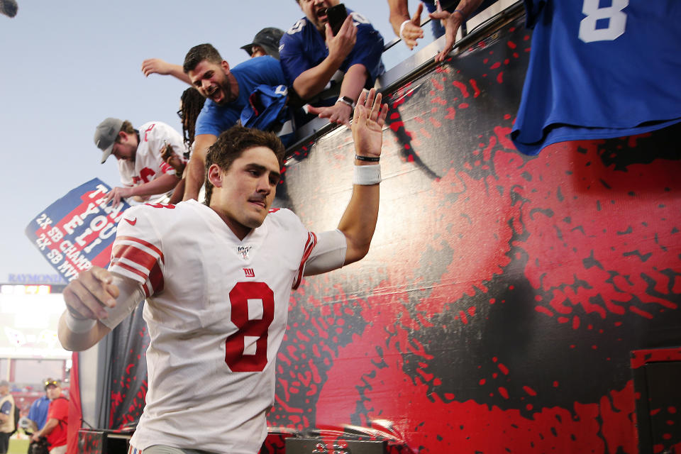 TAMPA, FLORIDA - SEPTEMBER 22:  Daniel Jones #8 of the New York Giants high fives fans after defeating the Tampa Bay Buccaneers 32-31 at Raymond James Stadium on September 22, 2019 in Tampa, Florida. (Photo by Michael Reaves/Getty Images)