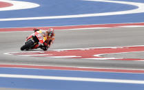 Marc Marquez of Spain leans into Turn 5 during the Grand Prix of the Americas MotoGP motorcycle race, Sunday, April 13, 2014, in Austin, Texas. Marquez won the race. (AP Photo/Tony Gutierrez)