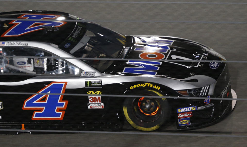 The front brakes of Kevin Harvick (glow red as he runs into Turn 1 during the NASCAR Cup series auto race at Richmond Raceway in Richmond, Va., Saturday, April 13, 2019. (AP Photo/Steve Helber)