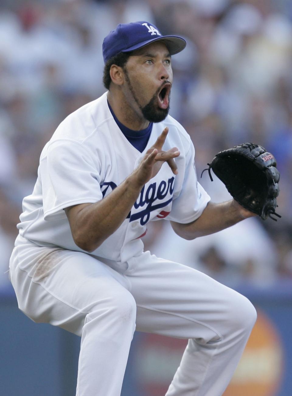 Dodgers starting pitcher Jose Lima reacts after striking out St. Louis Cardinals' Scott Rolen during Game 3 of the 2004 NLDS.