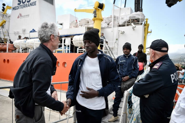 Migrants land in Sicily after being picked up at sea as they made the dangerous crossing from North Africa in search of a better life