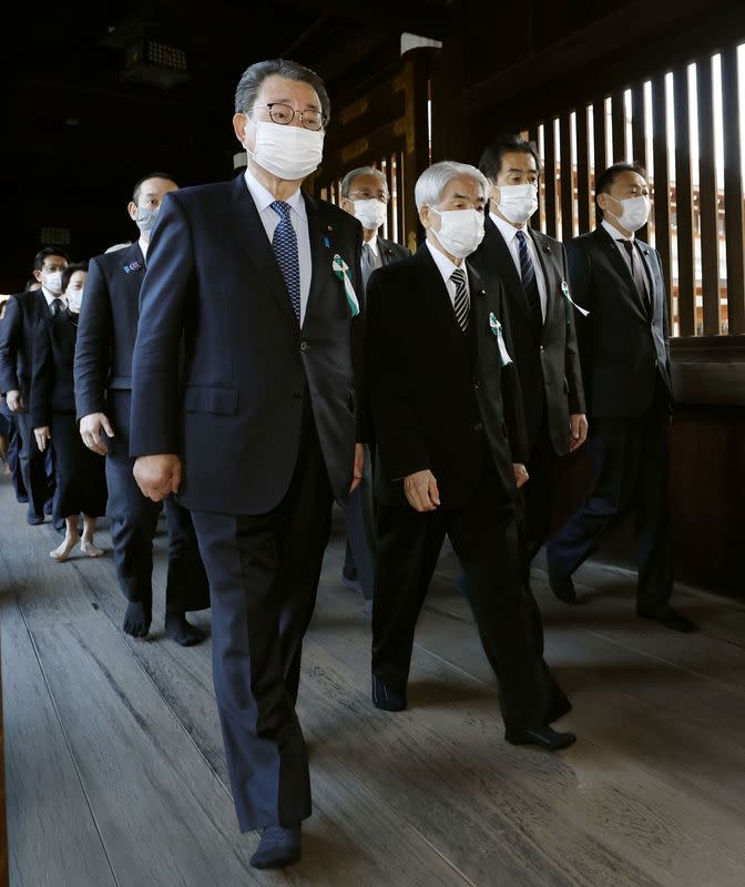 A group of Japanese lawmakers visit the Yasukuni shrine to pay respects to the country's war dead in Tokyo