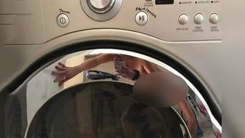 Close in image of nude woman in washer dryer ad X-rated fail