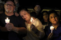 <p>Community members come together for a candlelight vigil for the victims of a deadly church shooting in Sutherland Springs, Texas, Nov. 5, 2017. (Laura Skelding/AP) </p>