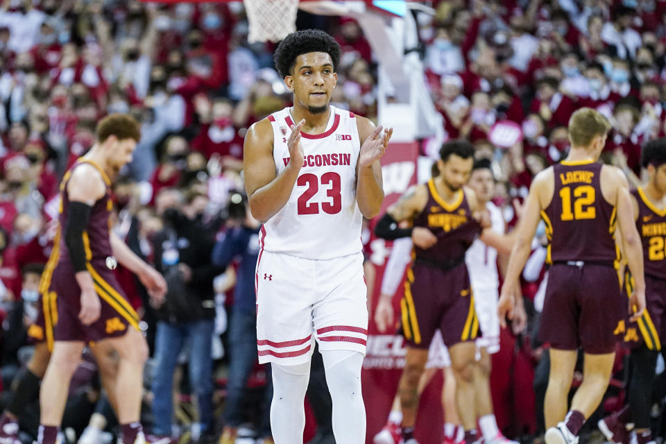 Wisconsin's Chucky Hepburn (23) claps after Wisconsin beat Minnesota 66-60 during an NCAA college basketball game Sunday, Jan. 30, 2022, in Madison, Wis. (AP Photo/Andy Manis)