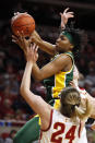 Baylor forward NaLyssa Smith, top, grabs a rebound over Iowa State guard Ashley Joens (24) during the second half of an NCAA college basketball game, Sunday, March 8, 2020, in Ames, Iowa. (AP Photo/Charlie Neibergall)
