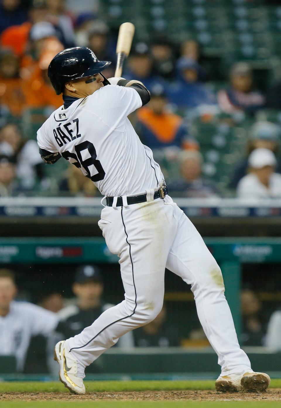 Javier Baez (28) of the Detroit Tigers hits a two-run home run against the Boston Red Sox during the eighth inning to take a 3-1 lead at Comerica Park on April 11, 2022, in Detroit, Michigan.