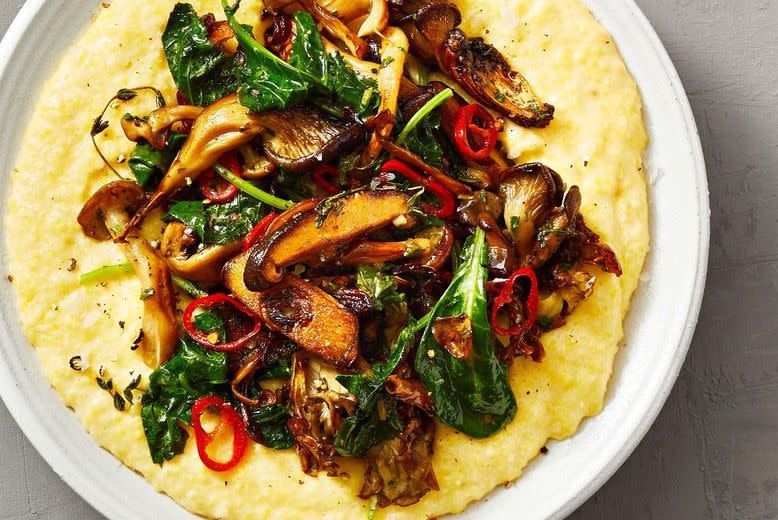 <p>Buttery polenta gets topped with an ultra-meaty mix of mushrooms in this hearty vegetarian main. It’s also great for sharing (or eating straight from the pot by yourself). </p><p>Get the <strong><a href="https://www.goodhousekeeping.com/food-recipes/a38867889/polenta-with-mushrooms-recipe/" rel="nofollow noopener" target="_blank" data-ylk="slk:Polenta with Mushrooms recipe;elm:context_link;itc:0;sec:content-canvas" class="link ">Polenta with Mushrooms recipe</a>. </strong></p><p><strong>RELATED:</strong> <a href="https://www.goodhousekeeping.com/food-recipes/g35059192/mushroom-recipes/" rel="nofollow noopener" target="_blank" data-ylk="slk:40 Best Mushroom Recipes That Are Packed with Natural Flavor;elm:context_link;itc:0;sec:content-canvas" class="link ">40 Best Mushroom Recipes That Are Packed with Natural Flavor </a></p>