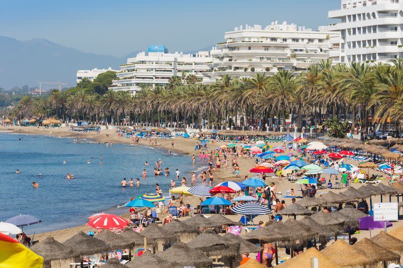 Marbella, Costa del Sol, Malaga Province, Andalusia, southern Spain.  Beach scene.  La Fontanilla beach.