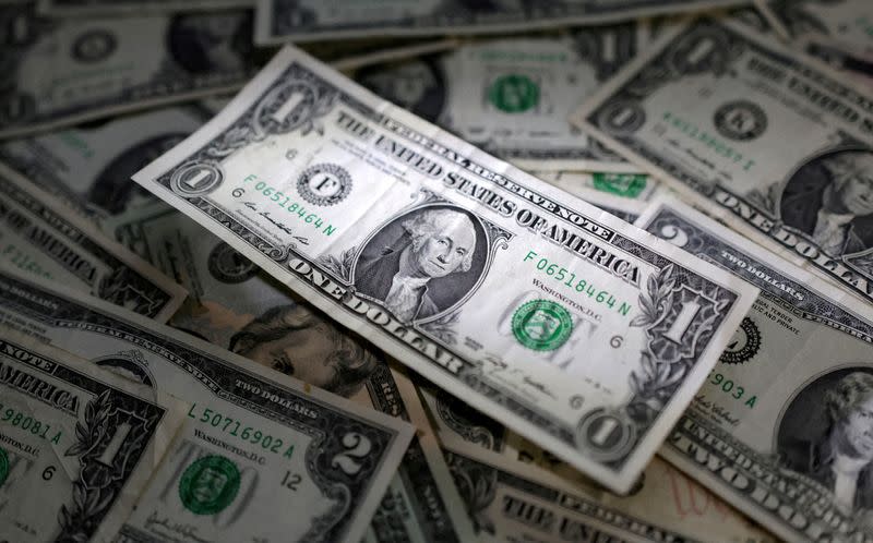 FILE PHOTO: FILE PHOTO: IMF says dollar's rise hit emerging markets harder than advanced economies
