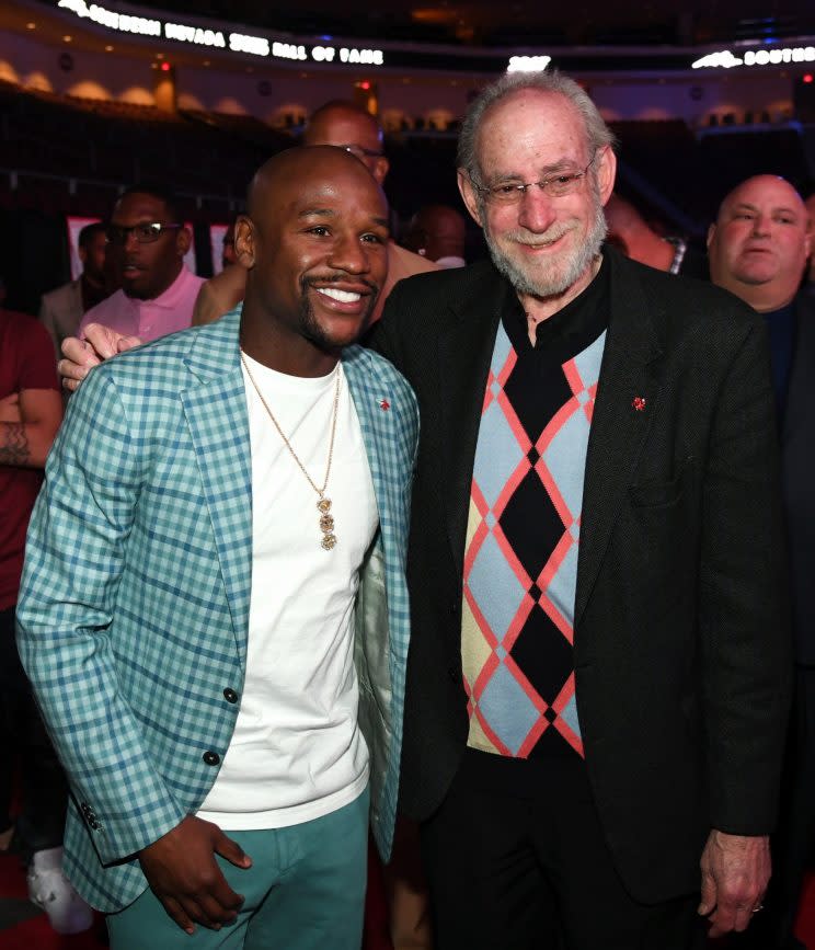 Floyd Mayweather (L) poses with UFC vice president Marc Ratner on June 2 in Las Vegas after being inducted into the Southern Nevada Sports Hall of Fame. (Getty Images)