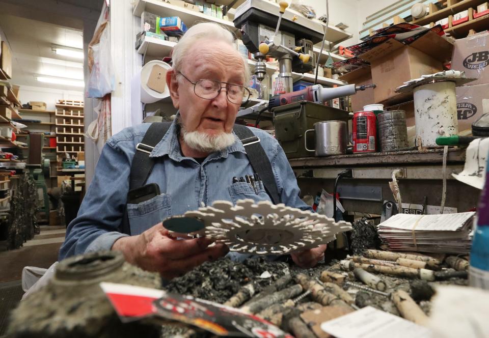 Don Drumm, 89, works on a new sun in his workshop in Akron May 1. Drumm tries to put 6 hours a day into his workshop.