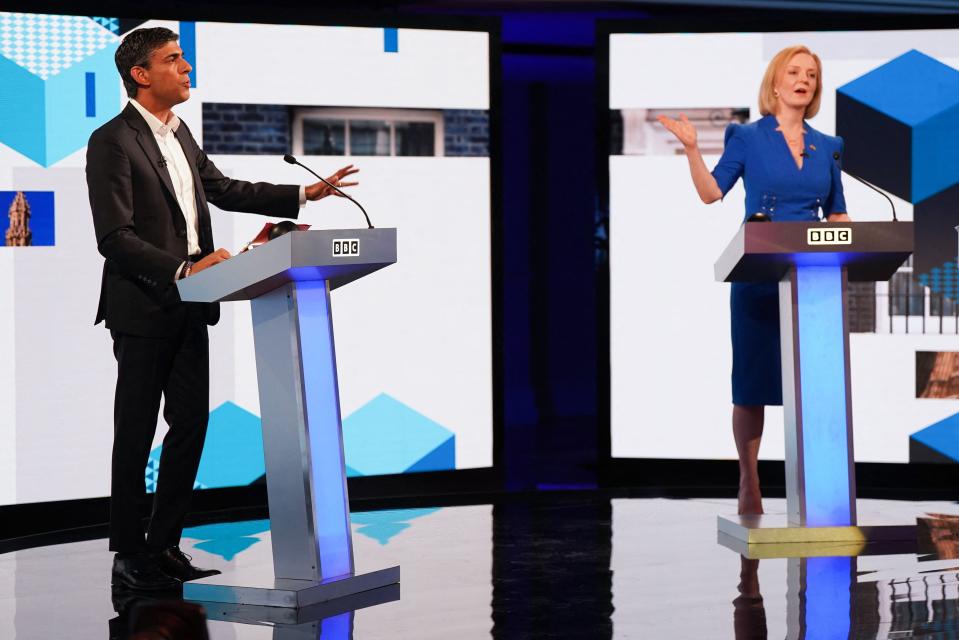 Britain's Foreign Secretary Liz Truss, right, and former chancellor to the exchequer, Rishi Sunak, contenders to become the country's next prime minister, take part in a debate in Stoke-on-Trent, central England, on July 25.