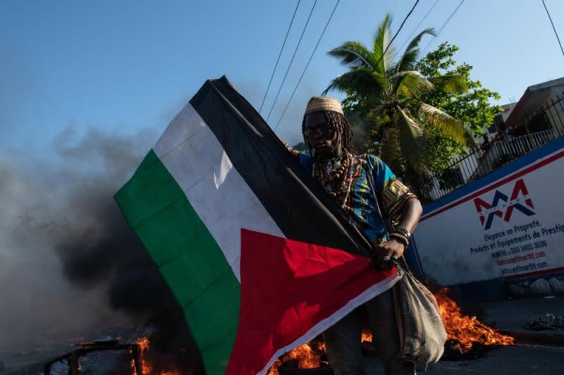 Protesters hold a demonstration to demand the resignation of Prime Minister Ariel Henry on March 7, in Port-au-Prince, Haiti. Henry official resigned last week to make way for a new government. Photo by Johnson Sabin/EPA-EFE