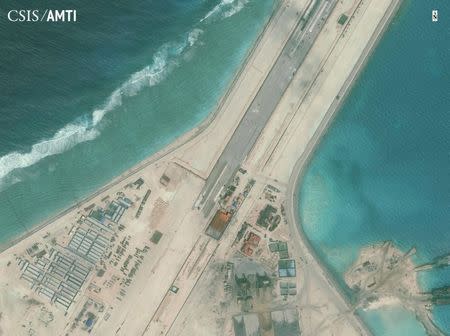 The center portion of the Subi Reef runway is shown in this Center for Strategic and International Studies (CSIS) Asia Maritime Transparency Initiative January 8, 2016 satellite image released to Reuters on January 15, 2016. REUTERS/CSIS Asia Maritime Transparency Initiative/Digital Globe/Handout via Reuters/File Photo