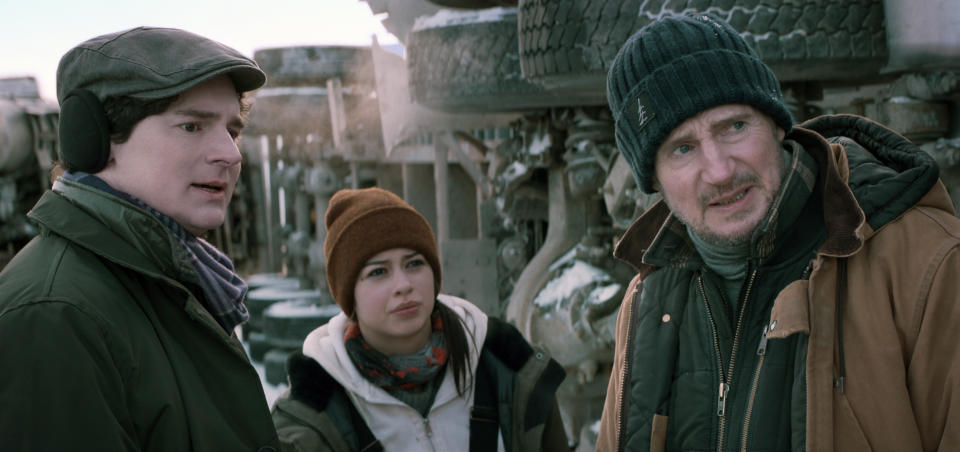 This image released by Netflix shows Benjamin Walker, from left, Amber Midthunder and Liam Neeson in a scene from "The Ice Road." (Netflix via AP)