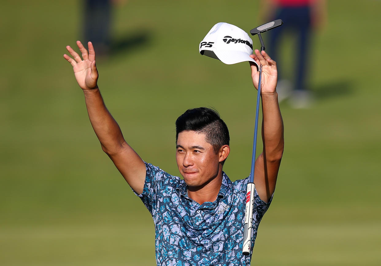 SANDWICH, ENGLAND - JULY 18: Collin Morikawa of the United States celebrates after his round on the 18th hole during Day Four of The 149th Open at Royal St George’s Golf Club on July 18, 2021 in Sandwich, England. (Photo by Christopher Lee/Getty Images)