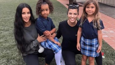 Penelope and North are mini-entrepreneurs with lemonade bracelet promotional stand