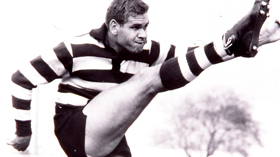 Graham 'Polly' Farmer, pictured here in action for the Geelong Cats in the VFL.