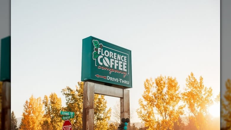 Coffee shop sign with trees