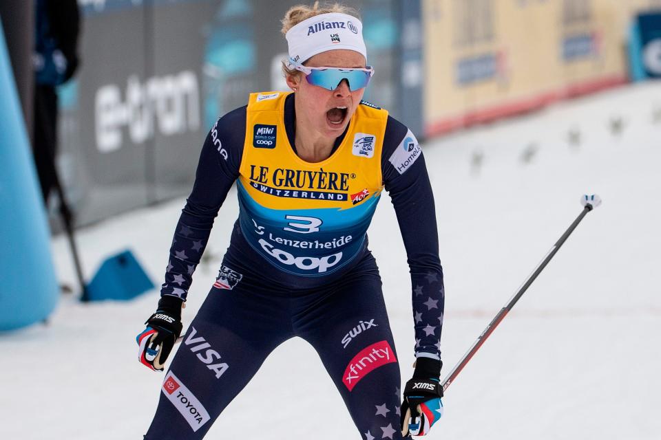 Jessie Diggins celebrates winning a cross-country ski sprint event at the FIS Tour de Ski in Lenzerheide, Switzerland, Tuesday, Dec. 28, 2021.