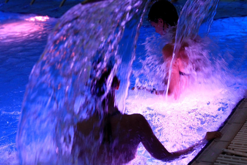 <p>People relax at the Lukacs Bath in Budapest, Hungary onJuly 6, 2016. (REUTERS/Bernadett Szabo) </p>