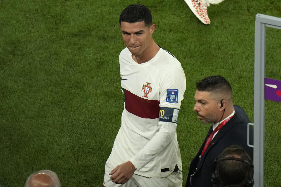 Portugal's Cristiano Ronaldo reacts as he leaves the field after their loss in the World Cup quarterfinal soccer match against Morocco, at Al Thumama Stadium in Doha, Qatar, Saturday, Dec. 10, 2022. (AP Photo/Alessandra Tarantino)