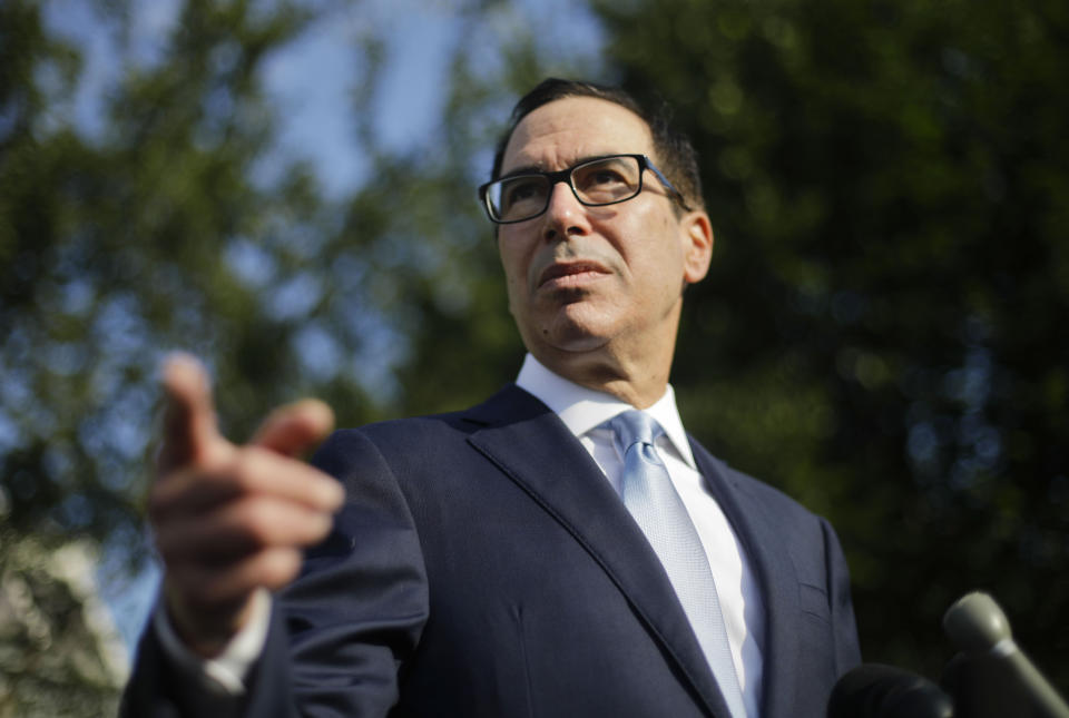 Treasury Secretary Steve Mnuchin speaks to members of the media at the White House in Washington, Wednesday, July 24, 2019. (AP Photo/Pablo Martinez Monsivais)