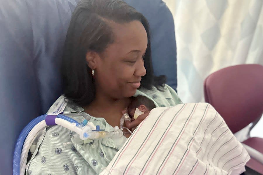 This undated photo shows mother NaKeya Haywood holding 6-month-old Nyla Brooke Haywood, a baby girl born Nov. 17, 2023, at Silver Cross Hospital in New Lenox, Ill. Nyla was born at just 22 weeks weighing 1 pound and 1 ounce, making her what’s known as a “micropreemie.” She left Silver Cross Hospital on Monday weighing a healthy 10 pounds, and was taken home by her first-time parents, NaKeya and Cory Haywood of Joliet, Ill. (NaKeya Haywood via AP)