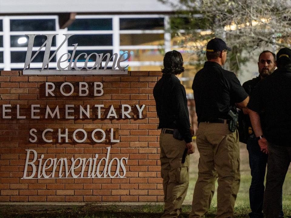 Law enforcement officers outside the elementary school on Tuesday (Getty Images)