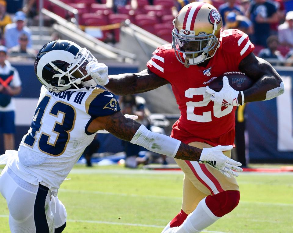 The 49ers put on a clinic on both sides of the ball to beat the Rams and remain unbeaten. (Reuters)