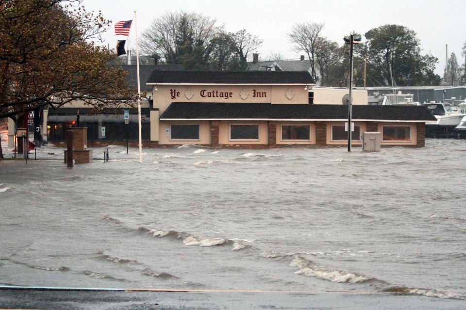 Waves form on a flooded parking lot on Front Street in Keyport around 7:30 a.m. Oct. 29, 2012, hours before the center of Superstorm Sandy made landfall.