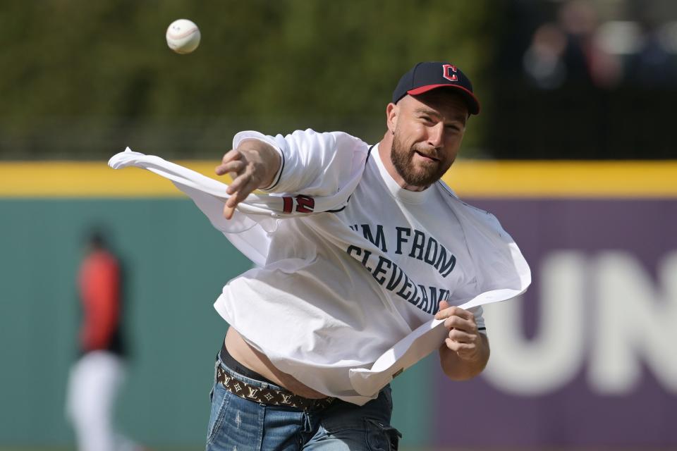 Kansas City Chiefs player Travis Kelce throws out the first pitch.