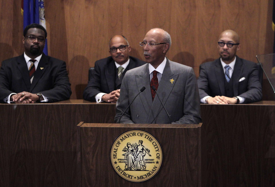 Detroit Mayor Dave Bing lays out his plans and highlights accomplishments in his third State of the City address in Detroit, Wednesday, March 7, 2012. In the background are Detroit City Council members from left, James Tate, Gary Brown, and President Charles Pugh. (AP Photo/Carlos Osorio)