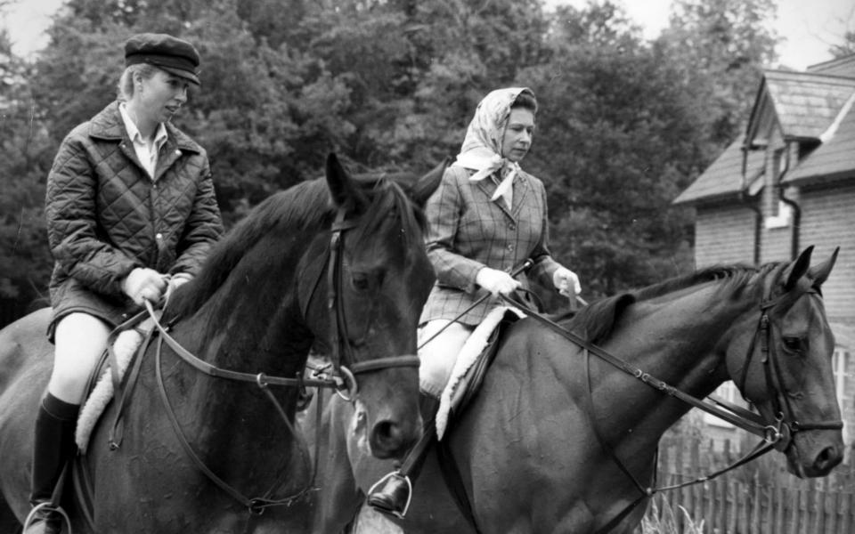 Princess Anne and The Queen riding together in 1975 - PA