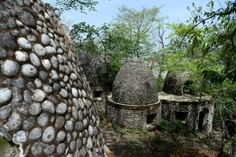 Meditation huts at the now-derelict ashram visited by the Beatles 50 years ago, in Rishikesh in northern India