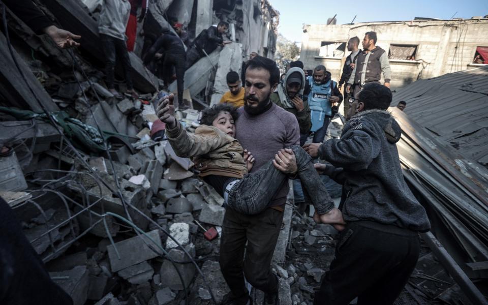 Palestine child is pulled out alive under the rubble